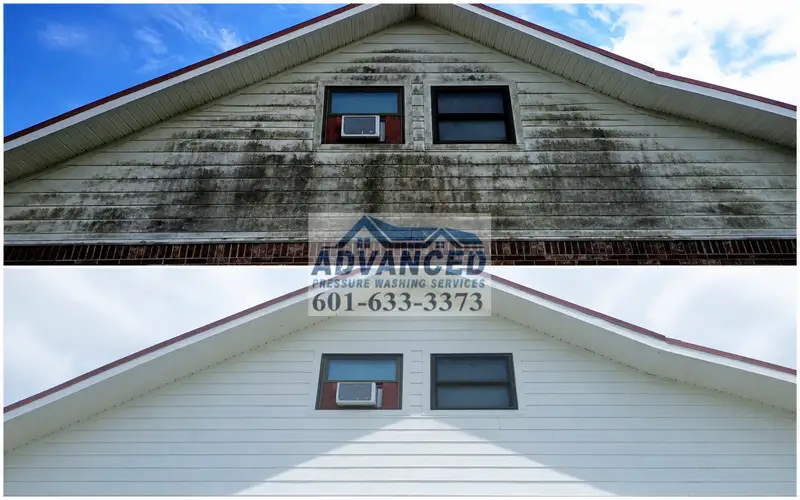Vinyl siding soft wash cleaning on a house exterior in Brandon MS