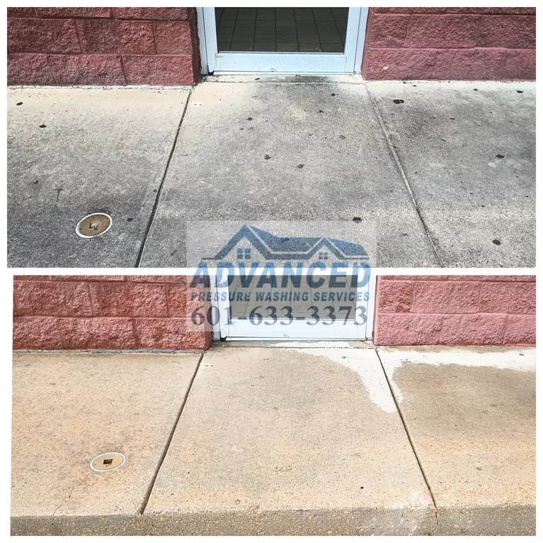 Advanced Pressure Washing Services showcases the power of professional concrete cleaning in Raymond, MS. This before-and-after image demonstrates how our expert team can revitalize stained, dirty sidewalks using advanced techniques like hot water pressure washing and eco-friendly degreasers. Improve your property's appearance, safety, and value with our commercial concrete cleaning services. #concretecleaning #commercialcleaning #RaymondMS #pressurewashing #sidewalkcleaning